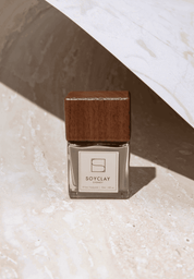 soyclay nailpolish photographed on beige travertine stone photography backdrop - backdrop collective australia melbourne