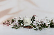 beige Shadow pattern double-sided vinyl photography backdrop photographed with jasmine flowers and jasmine candle - backdrop collective australia